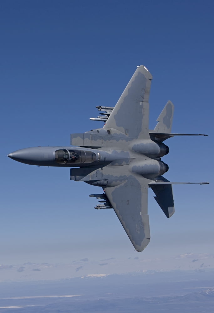 An F-15 Eagle conducts air-to-air training over Oregon Canvas Art - HIGH-G ProductionsStocktrek Images (24 x 35)