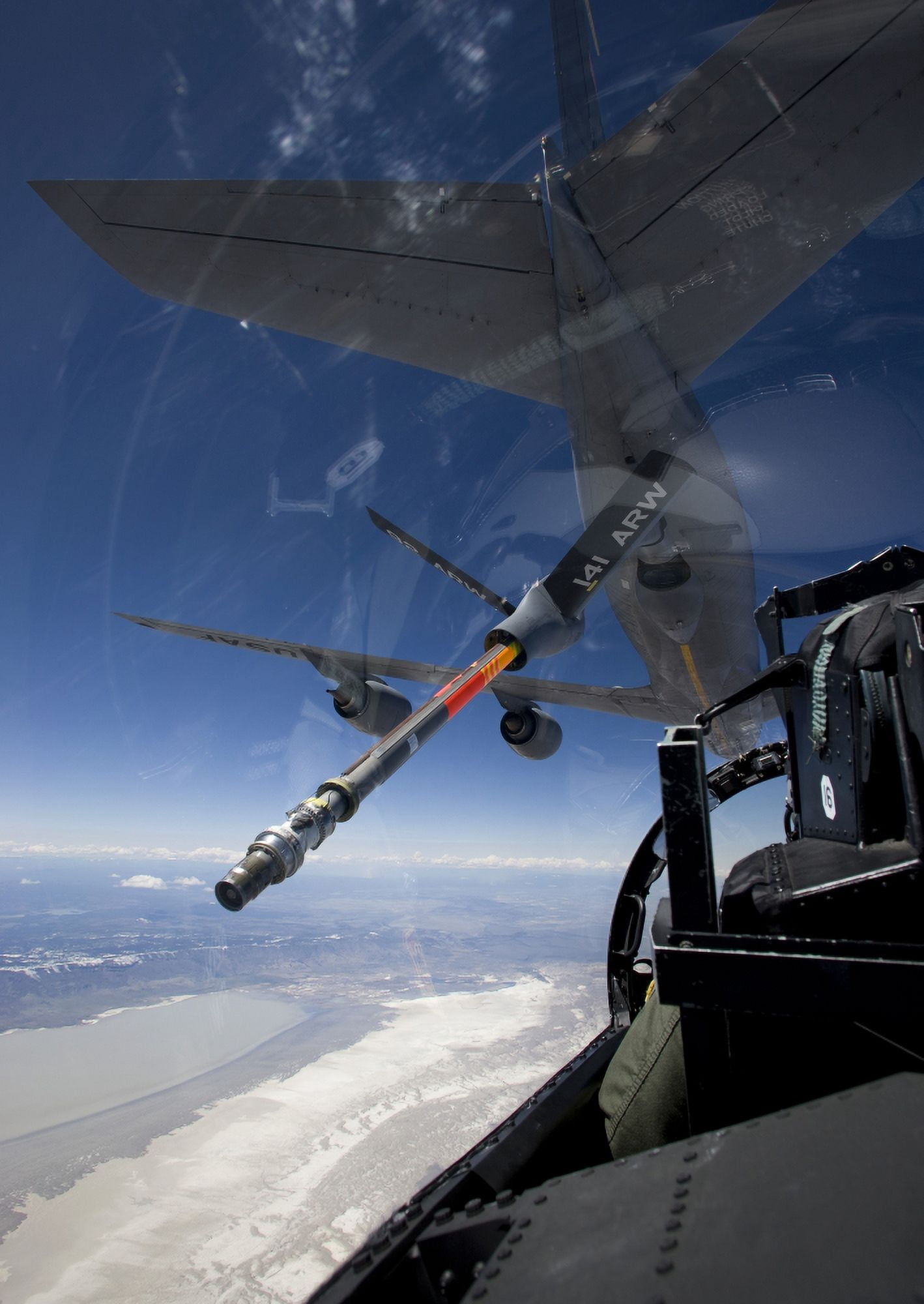 An F-15 Eagle pulls into position behind a KC-135 Stratotanker Canvas Art - HIGH-G ProductionsStocktrek Images (12 x 17)