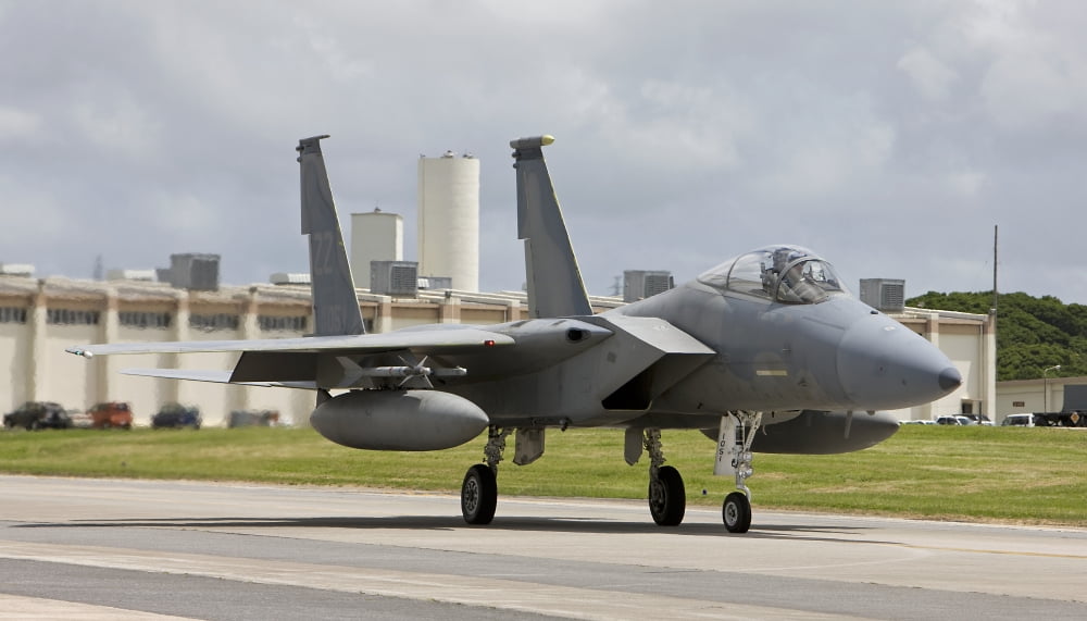 An F-15 Eagle taxis to the end of runway at Kadena Air Base Japan Canvas Art - HIGH-G ProductionsStocktrek Images (38 x 22)