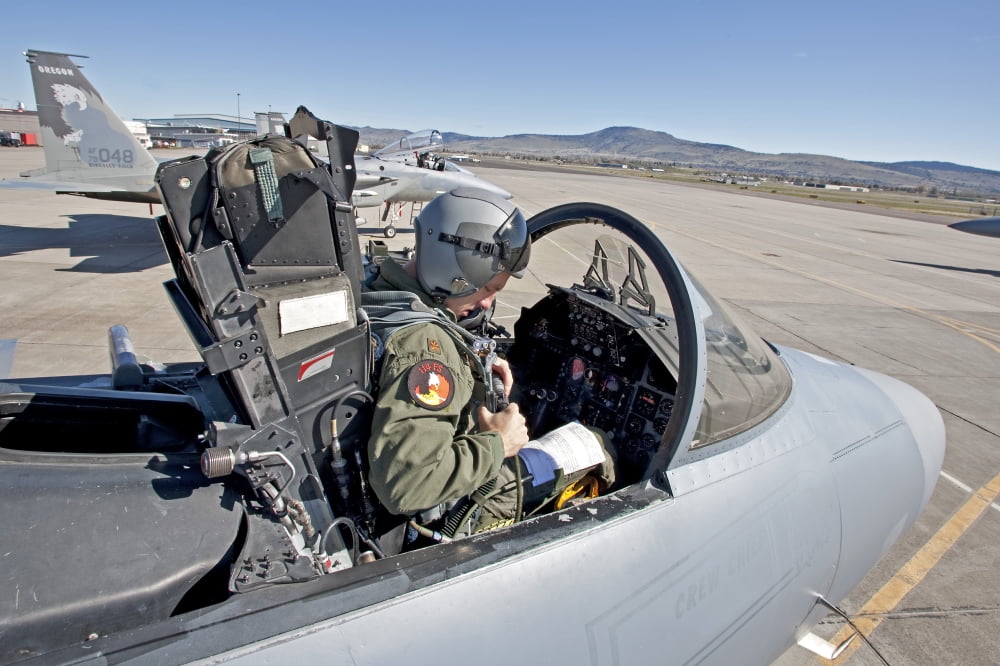 An F-15 pilot performs preflight checks prior to a mission Canvas Art - HIGH-G ProductionsStocktrek Images (18 x 12)