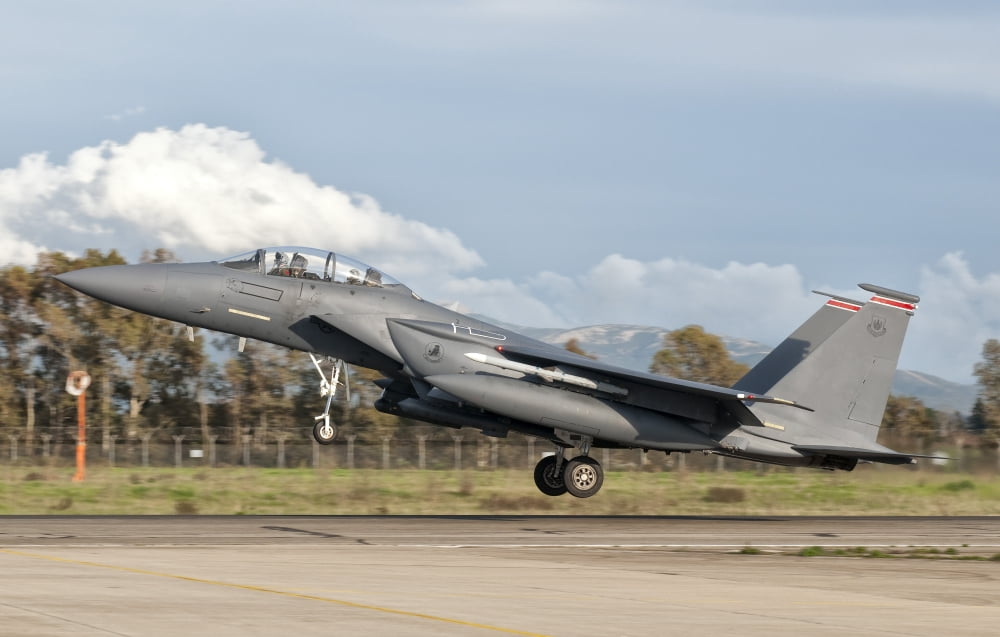 An F-15E Strike Eagle deploys from Decimomannu Air Base Italy Canvas Art - Giovanni CollaStocktrek Images (18 x 12)