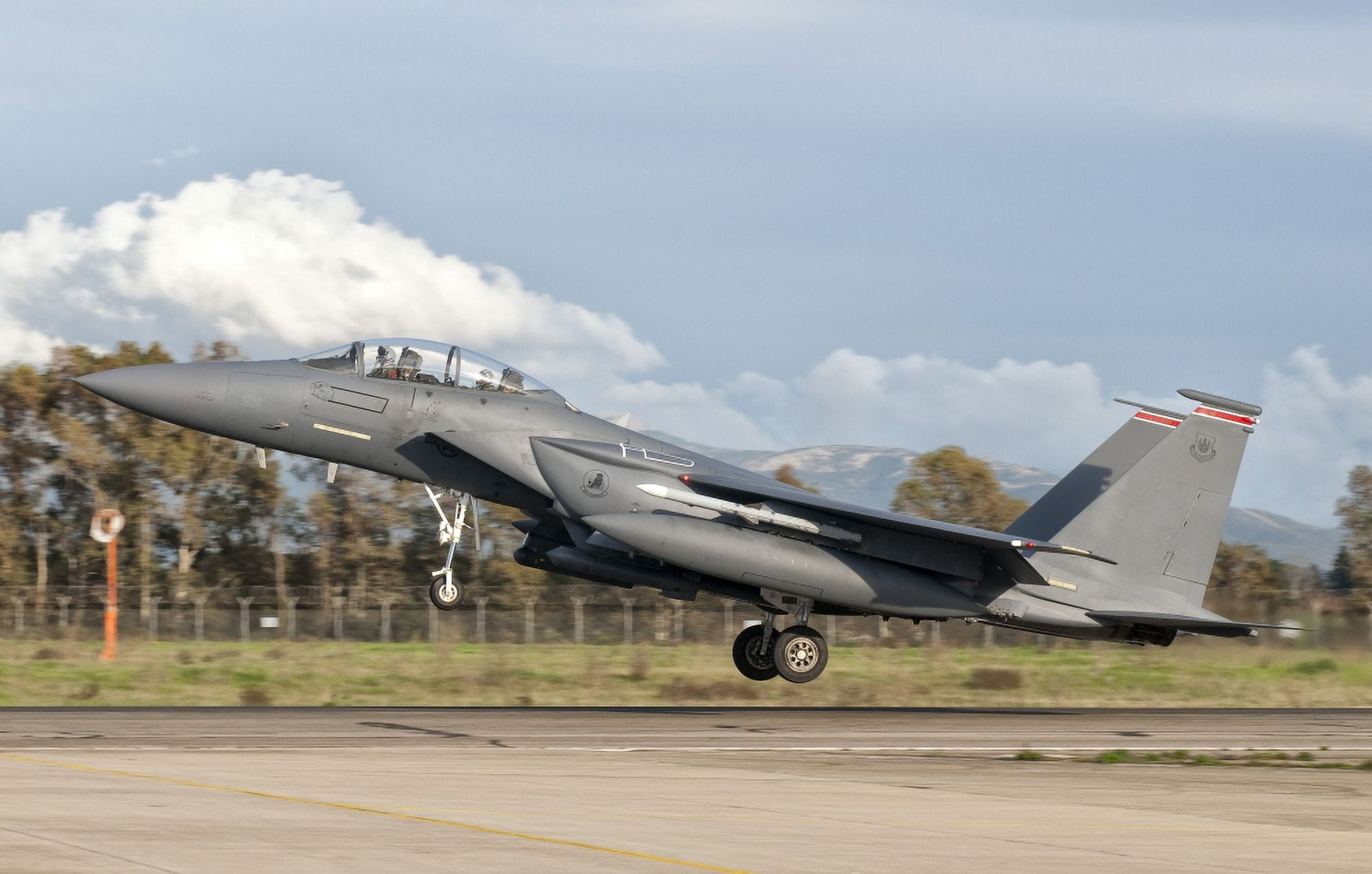 An F-15E Strike Eagle deploys from Decimomannu Air Base Italy Canvas Art - Giovanni CollaStocktrek Images (36 x 23)