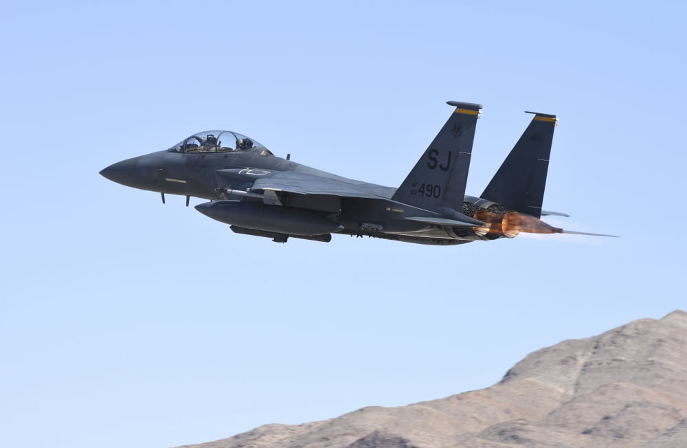 An F-15E Strike Eagle taking off from Nellis Air Force Base Nevada Canvas Art - Riccardo NiccoliStocktrek Images (17 x 12)