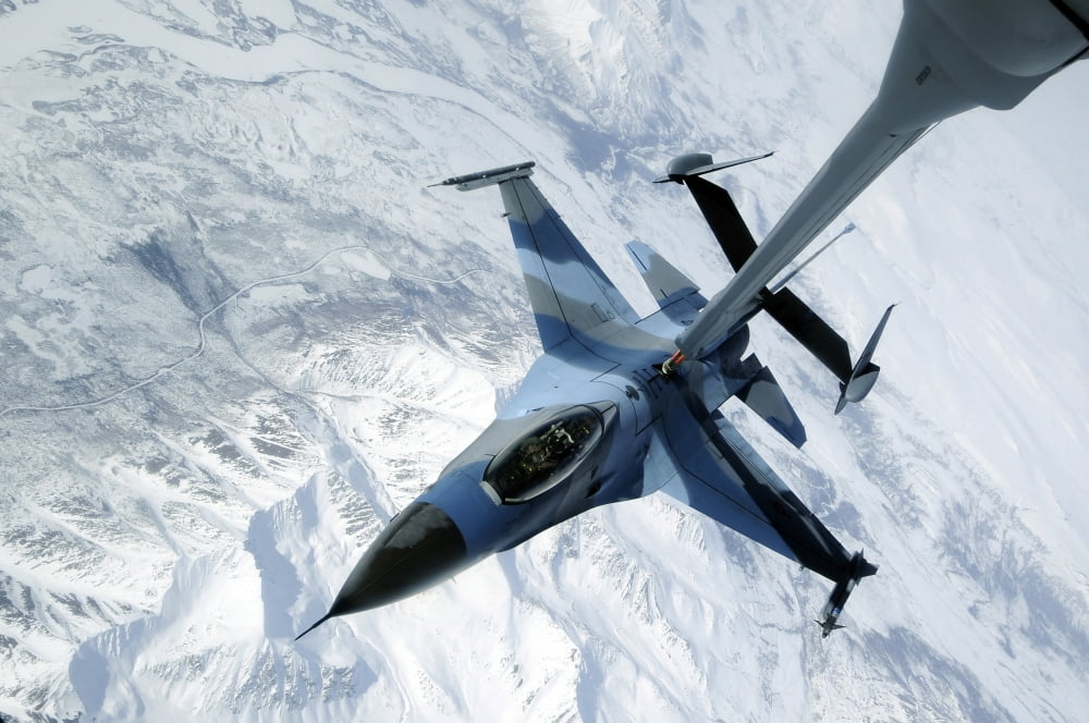 An F-16 Aggressor sits in contact position while a KC-10 Extender off-loads fuel Canvas Art - Stocktrek Images (34 x 23)