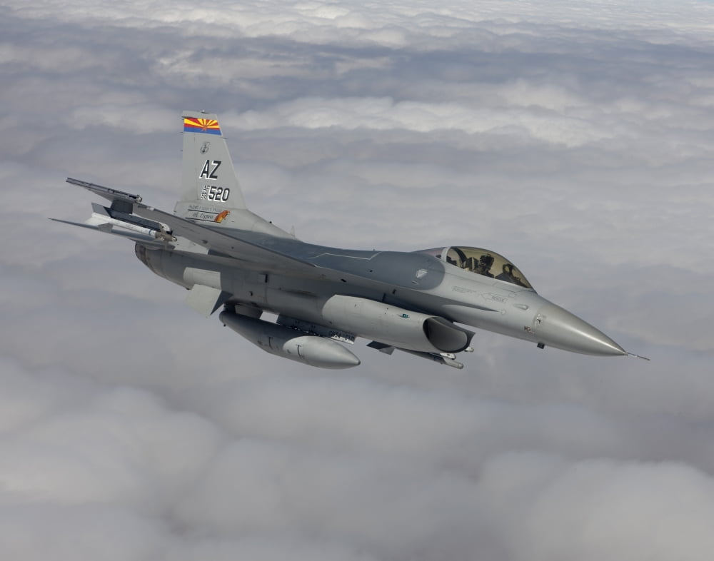 An F-16 Fighting Falcon maneuvers during a training mission Canvas Art - HIGH-G ProductionsStocktrek Images (32 x 26)