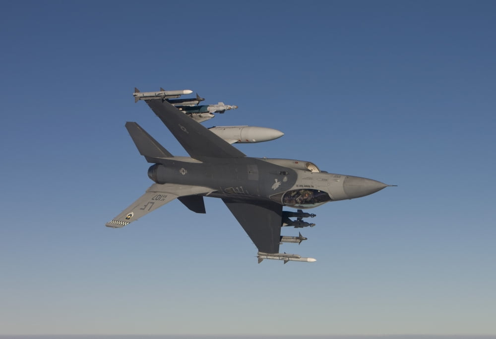 An F-16 Fighting Falcon manuevers during a training mission Canvas Art - HIGH-G ProductionsStocktrek Images (35 x 24)
