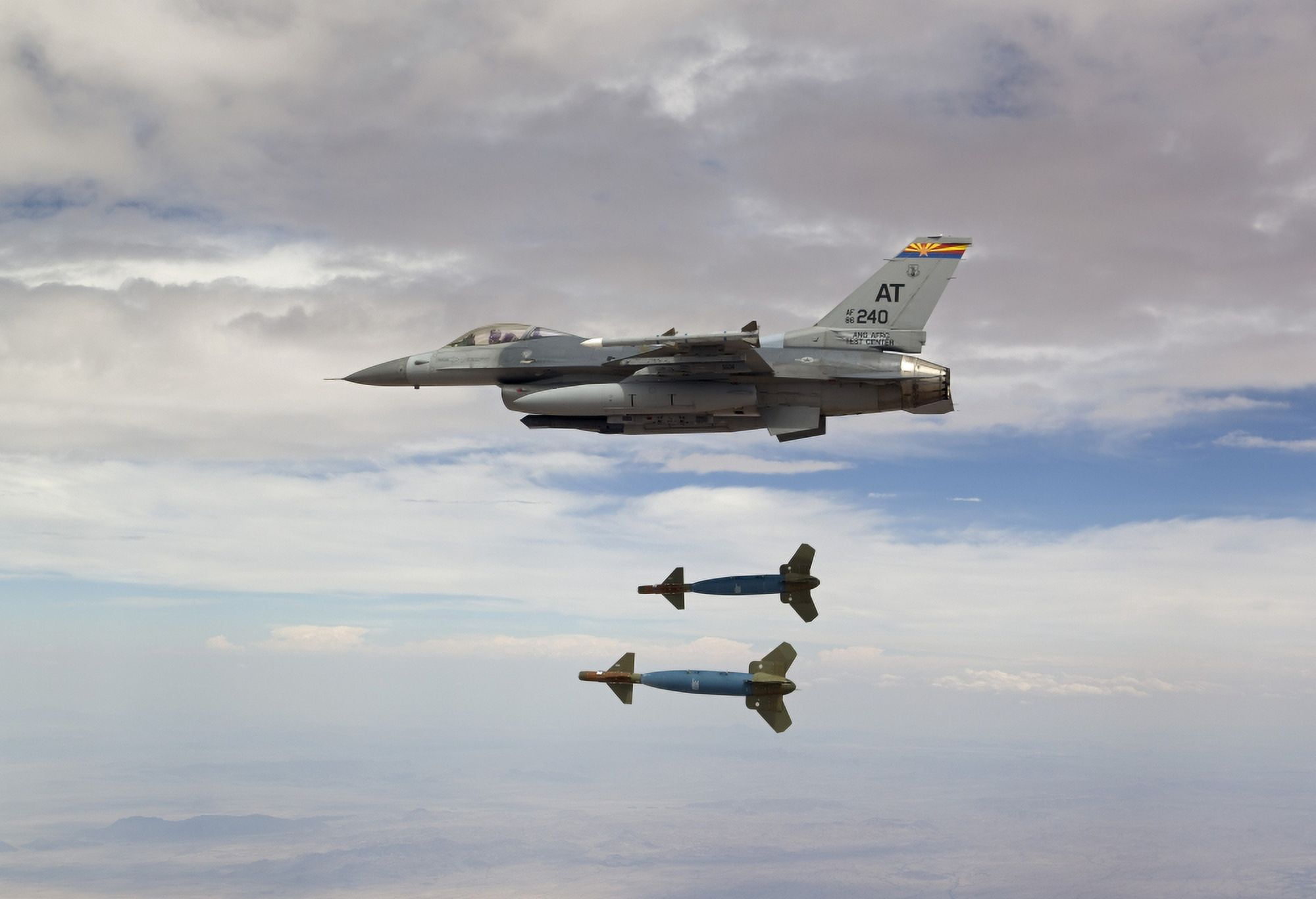 An F-16 Fighting Falcon releases two GBU-24 laser guided bombs Canvas Art - HIGH-G ProductionsStocktrek Images (35 x 24)