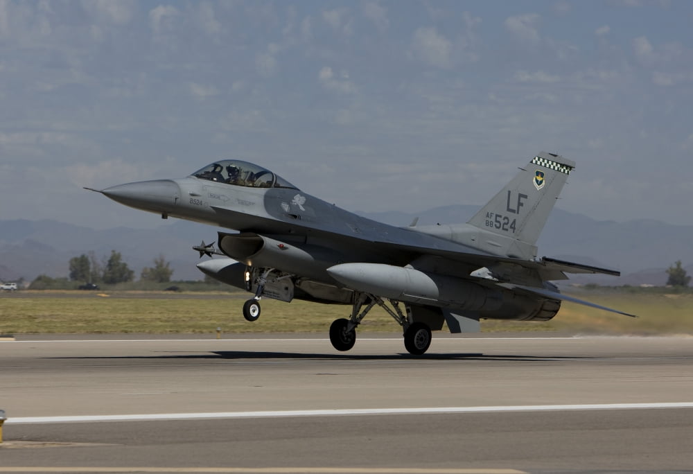 An F-16 Fighting Falcon takes off from Luke Air Force Base Arizona Canvas Art - HIGH-G ProductionsStocktrek Images (18 x 12)