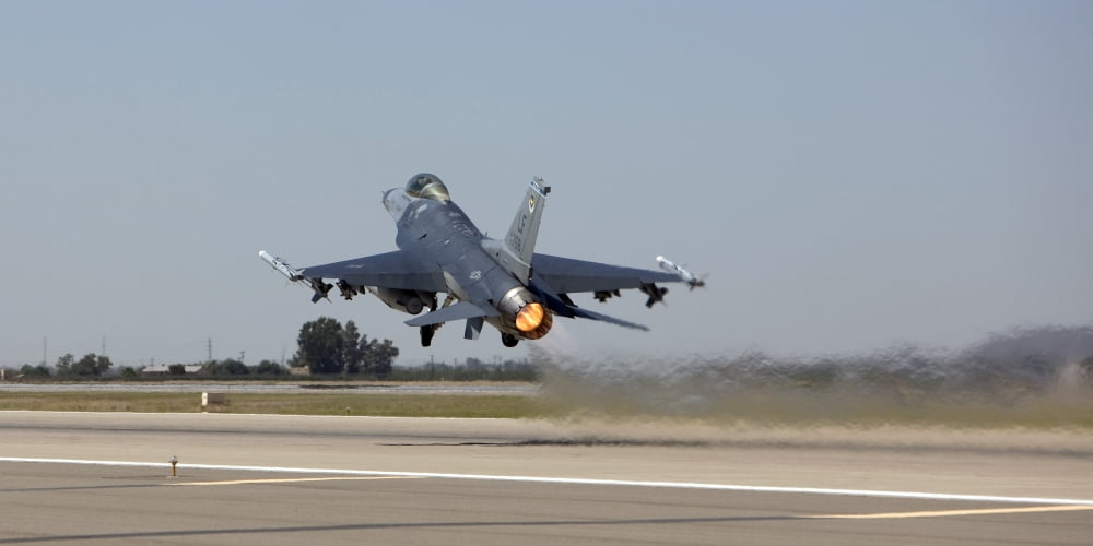 An F-16 Fighting Falcon takes off from Luke Air Force Base Arizona Canvas Art - HIGH-G ProductionsStocktrek Images (20 x 10)