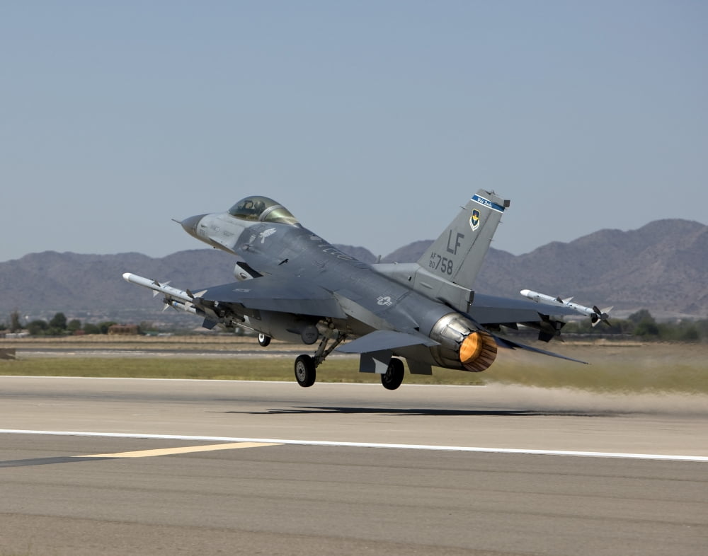 An F-16 Fighting Falcon takes off from Luke Air Force Base Arizona Canvas Art - HIGH-G ProductionsStocktrek Images (32 x 26)
