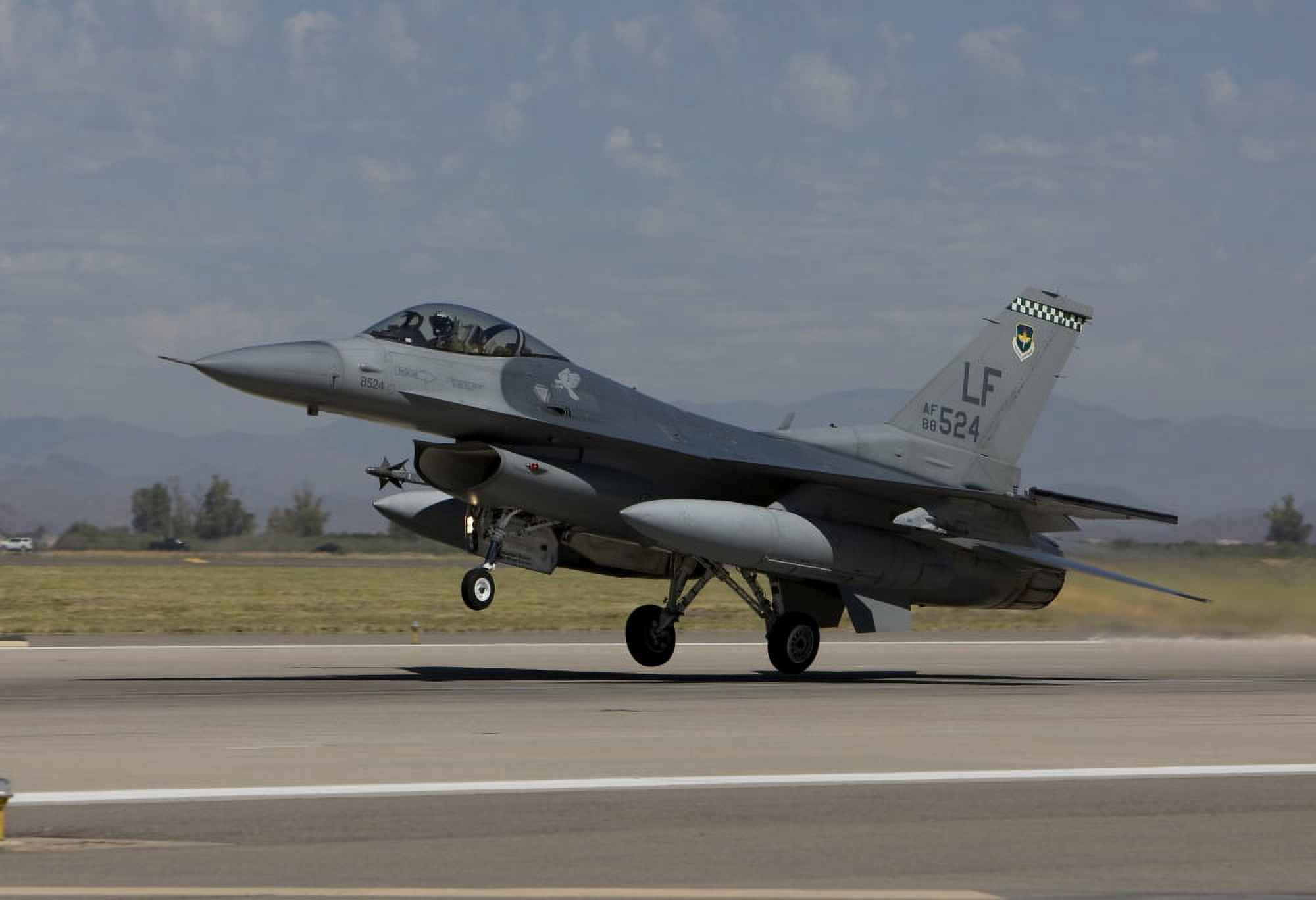 An F-16 Fighting Falcon takes off from Luke Air Force Base Arizona Canvas Art - HIGH-G ProductionsStocktrek Images (35 x 24)