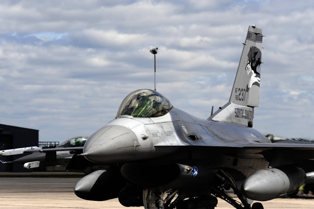 An F-16 Fighting Falcon taxis out for a training mission Canvas Art - Stocktrek Images (34 x 23)