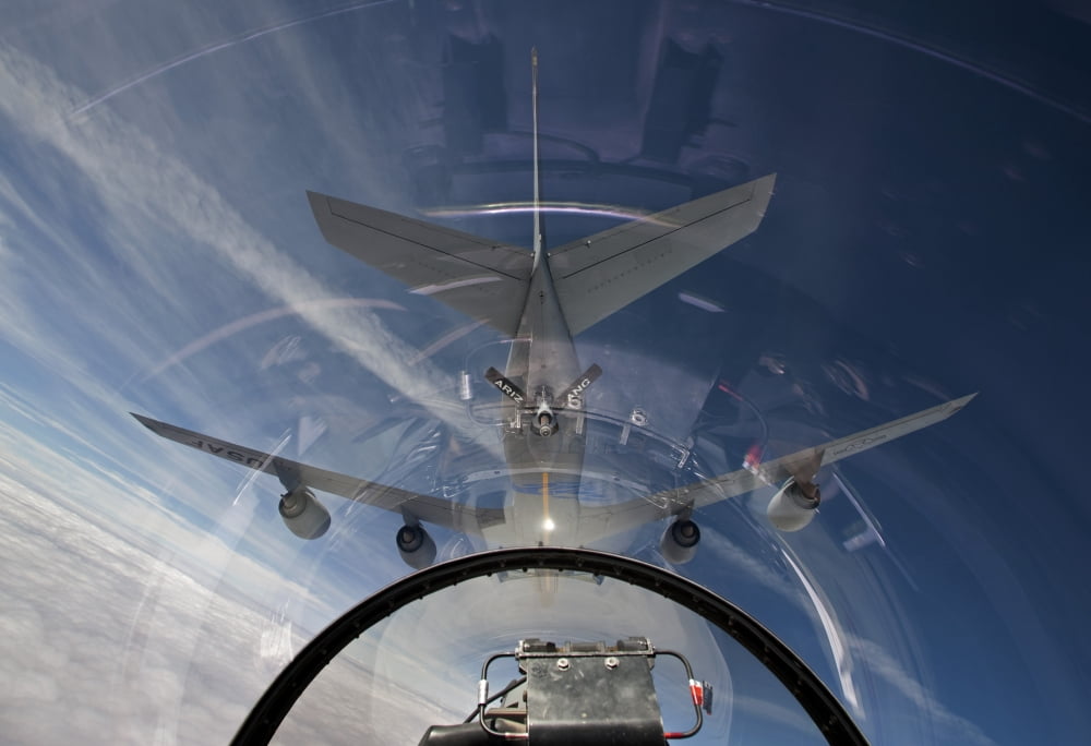 An F-16 flies in the pre-contact position behind a KC-135R Stratotanker Canvas Art - HIGH-G ProductionsStocktrek Images (18 x 12)