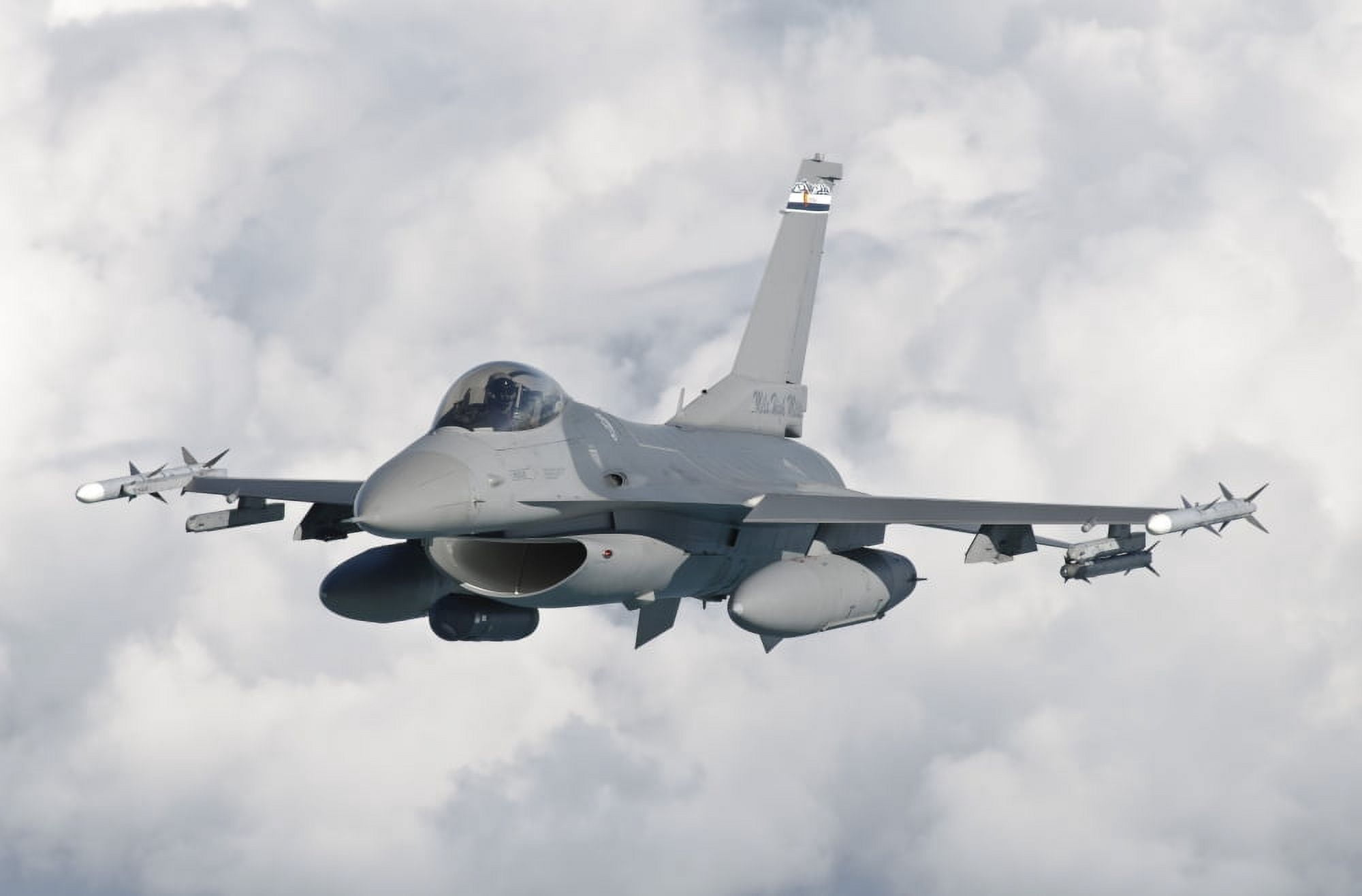 An F-16 from the Colorado Air National Guard in flight over Brazil Canvas Art - Giovanni CollaStocktrek Images (35 x 23)