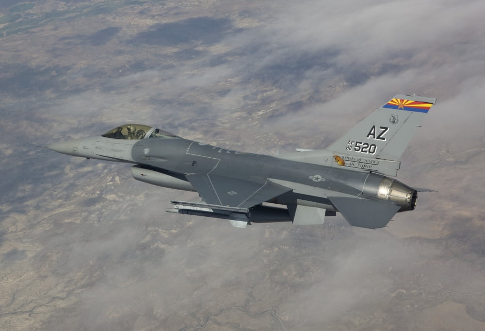 An F-16 maneuvers during a training mission over Arizona Canvas Art - HIGH-G ProductionsStocktrek Images (35 x 24)