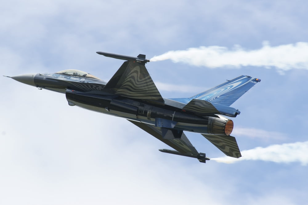 An F-16A Mide-Life Update of the Belgian Air Force in flight Canvas Art - Ramon Van OpdorpStocktrek Images (35 x 24)