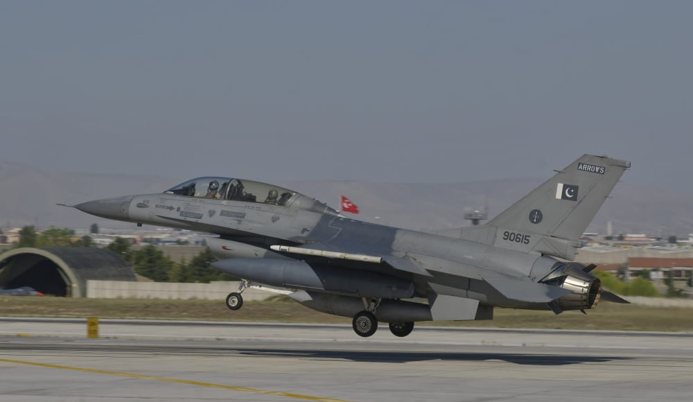 An F-16B of the Pakistan Air Force takes off from Konya Air Base Turkey Canvas Art - Giovanni CollaStocktrek Images (19 x 11)