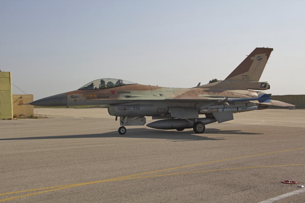 An F-16C Barak of the Israeli Air Force at Ramat David Air Force Base Canvas Art - Ofer ZidonStocktrek Images (18 x 12)