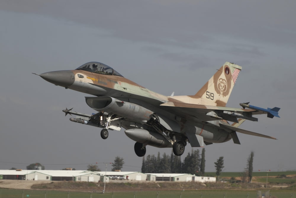 An F-16C Barak of the Israeli Air Force landing at Hatzor Air Force Base Canvas Art - Ofer ZidonStocktrek Images (18 x 12)