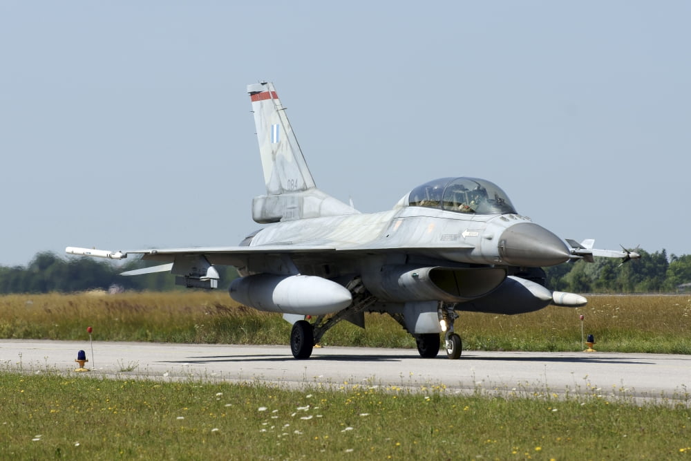 An F-16C Block 50 aircraft of the Hellenic Air Force in Lechfeld Germany Canvas Art - Ramon Van OpdorpStocktrek Images (18 x 12)