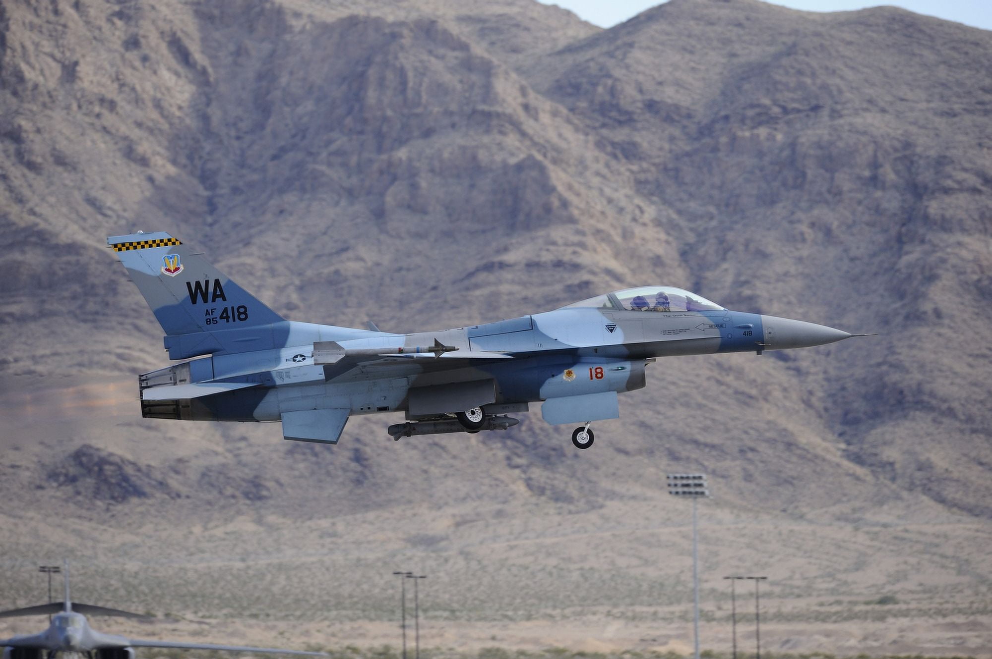 An F-16C Falcon of the 65th Aggressor Squadron taking off Canvas Art - Remo GuidiStocktrek Images (18 x 12)