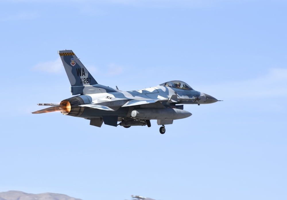 An F-16C Fighting Falcon from 64th Aggressor Squadron of US Air Force Canvas Art - Riccardo NiccoliStocktrek Images (17 x 12)