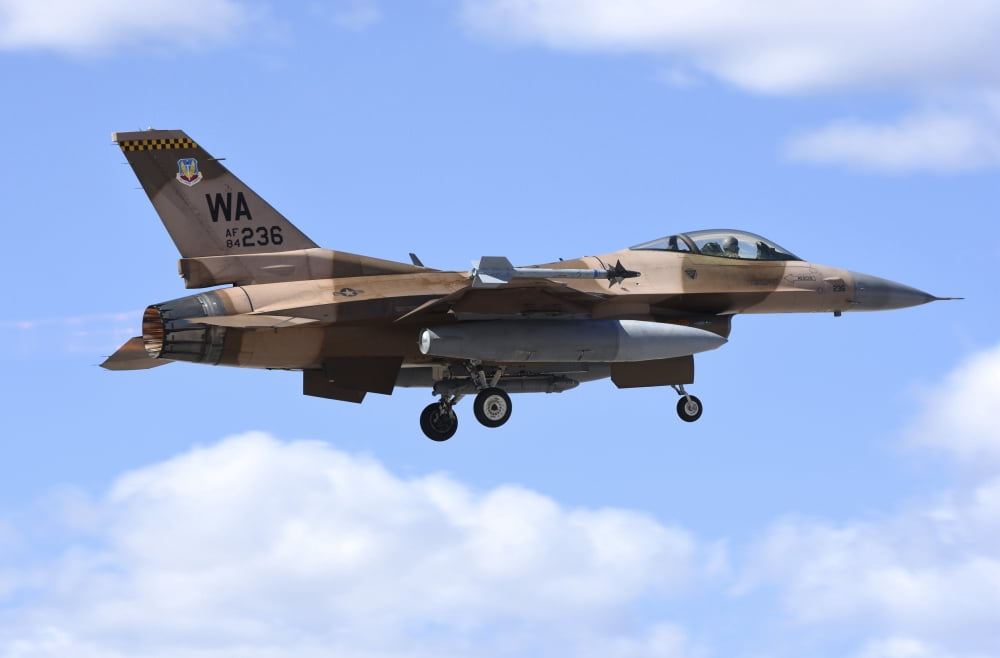 An F-16C Fighting Falcon from 64th Aggressor Squadron of US Air Force Canvas Art - Riccardo NiccoliStocktrek Images (34 x 23)