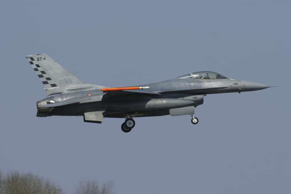 An F-16C Fighting Falcon of the Italian Air Force Canvas Art - Ramon Van OpdorpStocktrek Images (35 x 23)