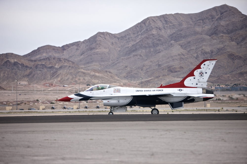 An F-16C Thunderbird sits on the runway at Nellis Air Force Base Nevada Canvas Art - Terry MooreStocktrek Images (18 x 12)