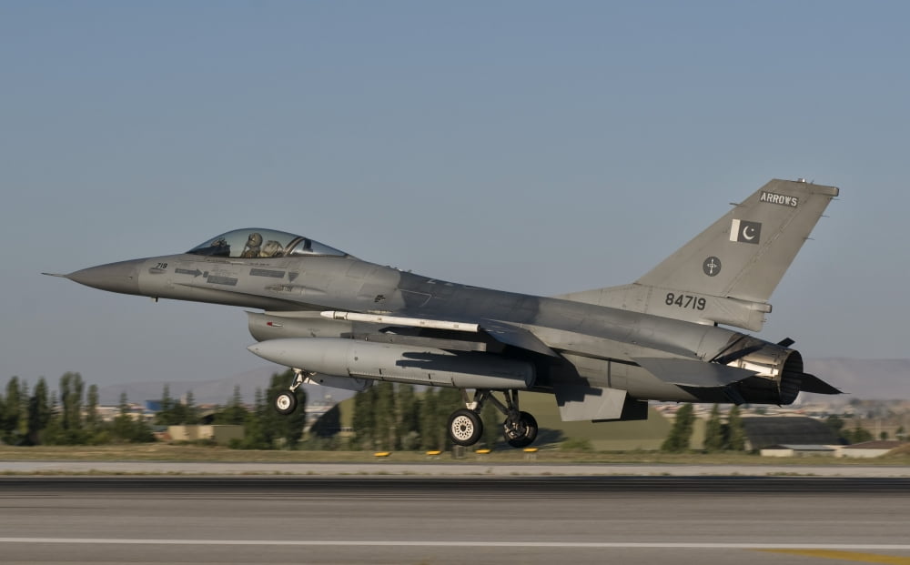 An  F-16C of the Pakistan Air Force takes off from Konya Air Base Turkey Canvas Art - Giovanni CollaStocktrek Images (18 x 11)
