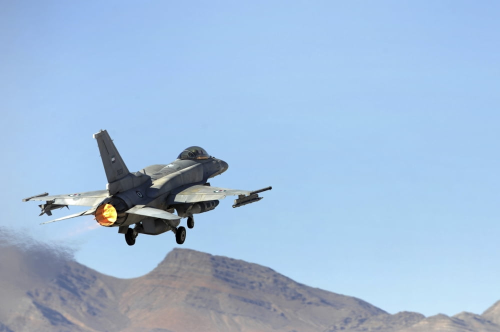 An F-16E from the United Arab Emirates taking off for a training mission at Nellis Air Force Base Nevada Canvas Art - Stocktrek Images (34 x 23)