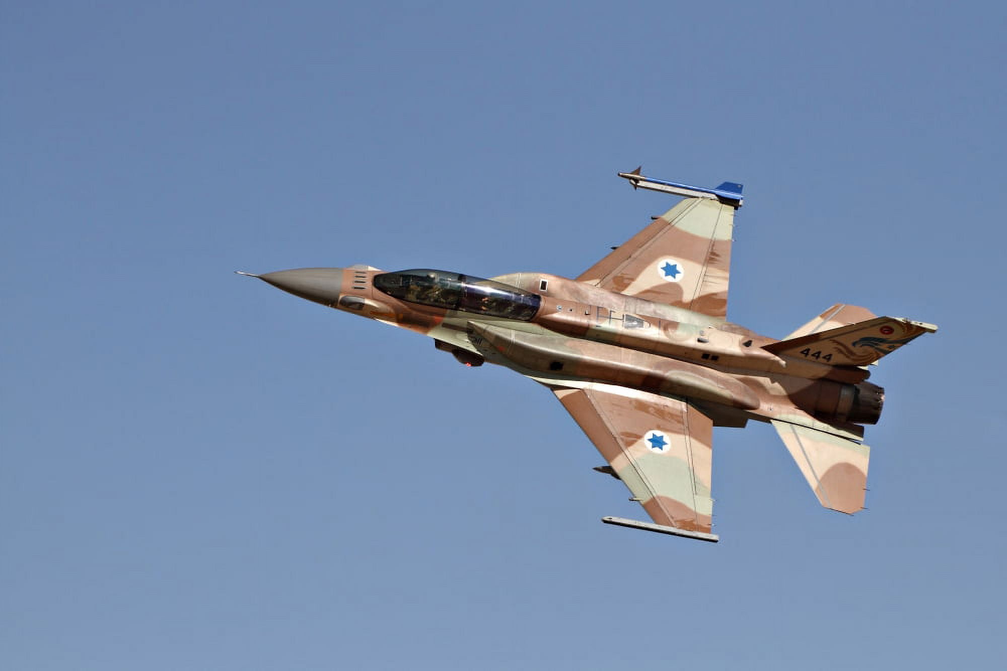 An F-16I Sufa of the Israeli Air Force in flight over Israel Canvas Art - Ofer ZidonStocktrek Images (35 x 23)