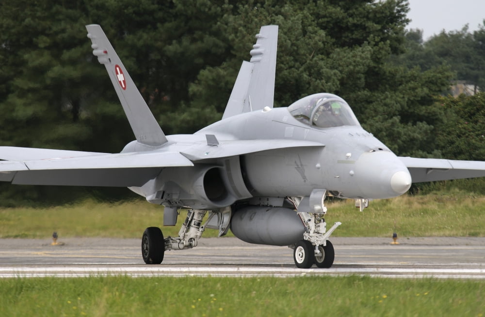 An F-18C Hornet of the Swiss Air Force Canvas Art - Timm ZiegenthalerStocktrek Images (18 x 12)