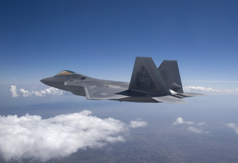 An F-22 Raptor flies around Southern New Mexico Canvas Art - HIGH-G ProductionsStocktrek Images (18 x 12)