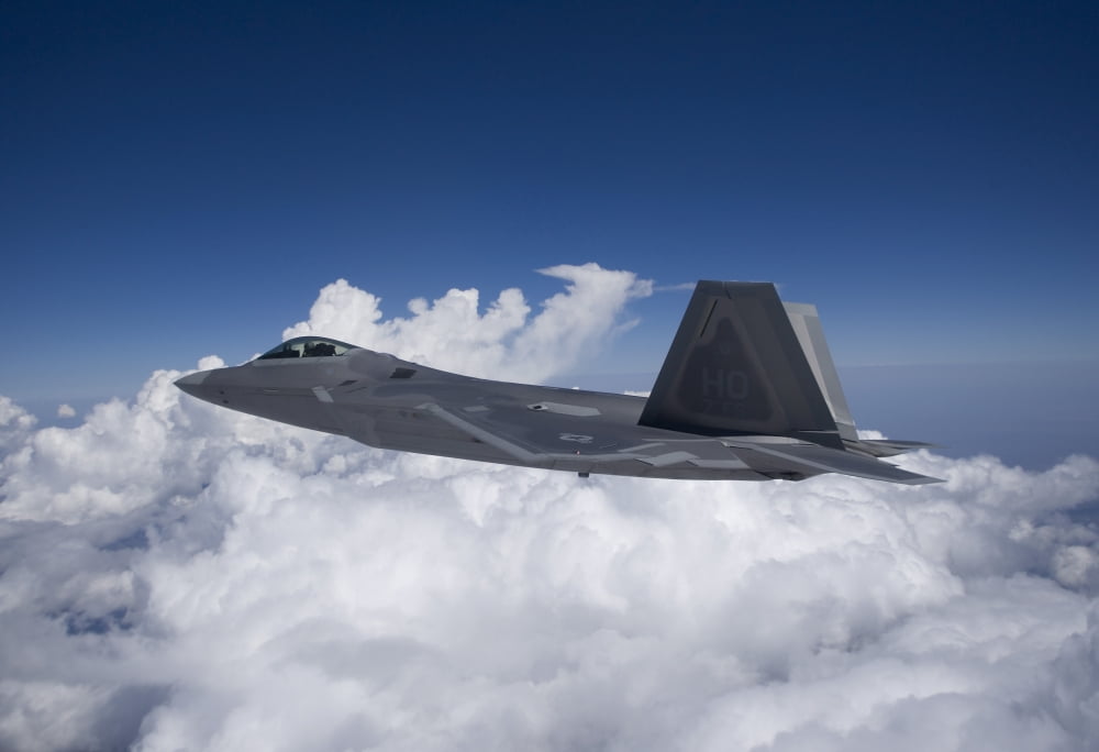 An F-22 Raptor flies around Southern New Mexico Canvas Art - HIGH-G ProductionsStocktrek Images (35 x 24)
