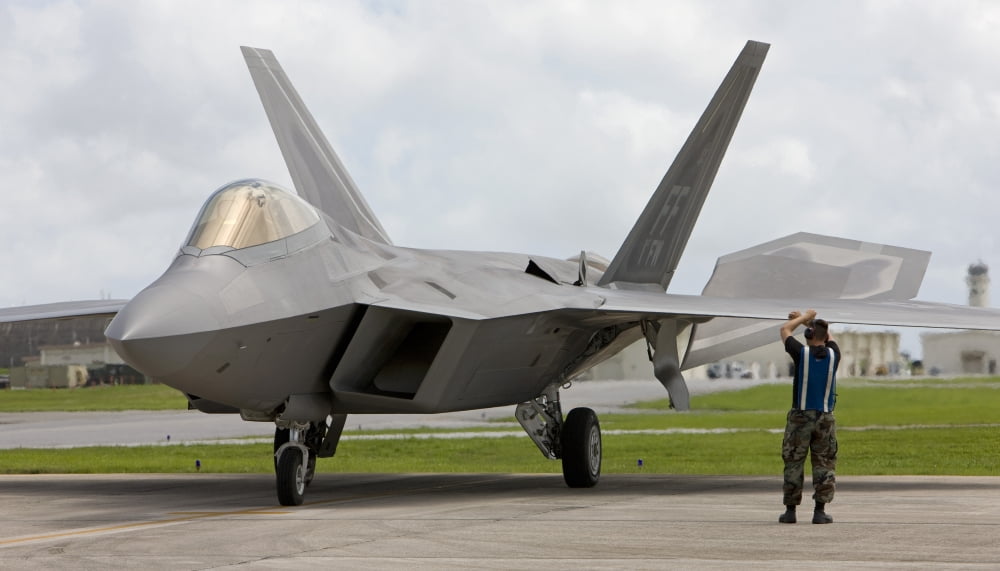An F-22 Raptor goes through pre-flight checks at Kadena Air Base Canvas Art - HIGH-G ProductionsStocktrek Images (19 x 11)