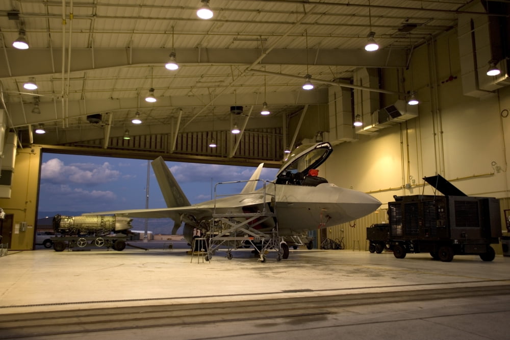 An F-22 Raptor parked in the hangar at Holloman Air Force Base Canvas Art - HIGH-G ProductionsStocktrek Images (36 x 24)