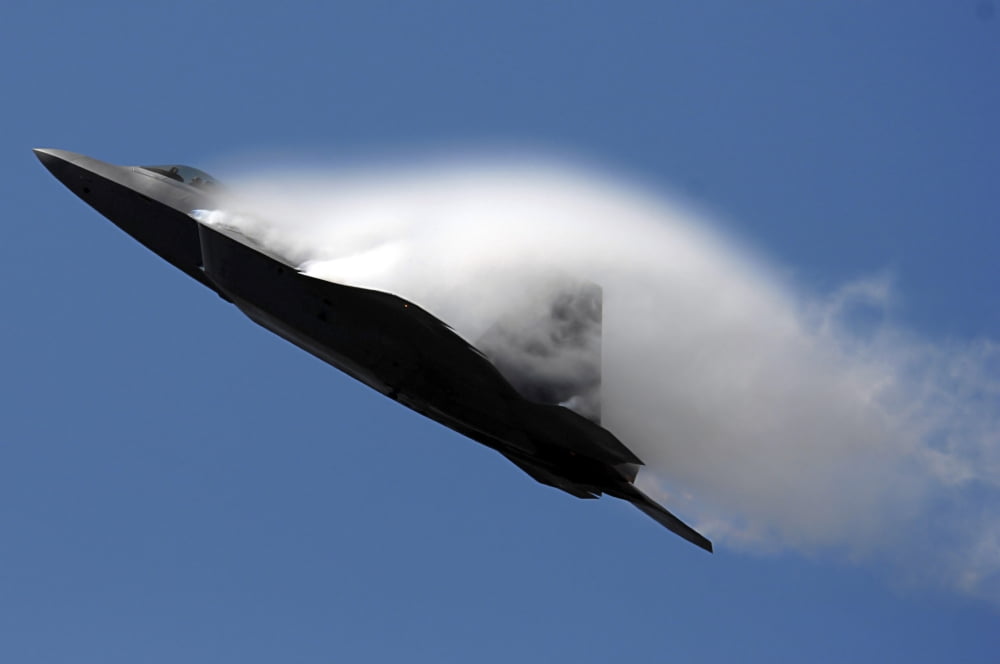 An F-22 Raptor performs during an air show Canvas Art - Stocktrek Images (34 x 23)