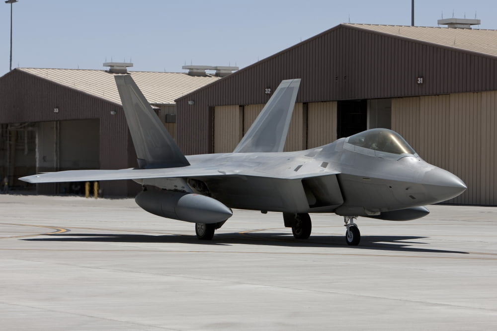 An F-22 Raptor taxis to the runway for a training mission Canvas Art - HIGH-G ProductionsStocktrek Images (18 x 12)