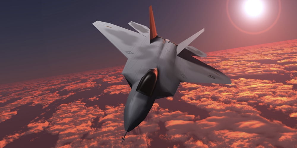 An F-22 fighter jet flies at an altitude above the cloud layer on its mission Canvas Art - Corey FordStocktrek Images (20 x 10)