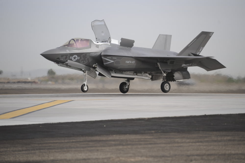 An F-35B Lightning II Joint Strike Fighter prepares to make a vertical landing Canvas Art - Stocktrek Images (35 x 23)