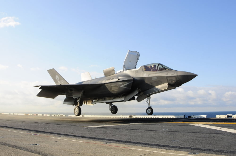 An F-35B Lightning II lifts off the flight deck of USS Wasp Canvas Art - Stocktrek Images (35 x 23)