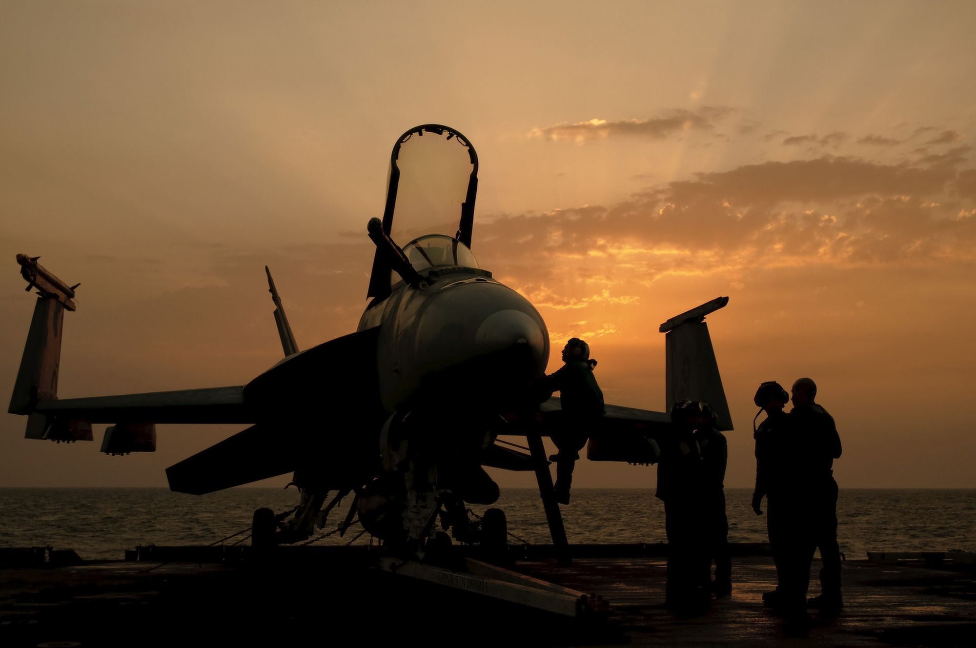 An F18C Hornet aboard USS George HW Bush during sunrise Canvas Art - Giovanni CollaStocktrek Images (35 x 24)
