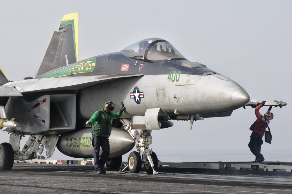 An FA-18 Super Hornet is ready to launch from a catapult aboard USS Harry S Truman Canvas Art - Giovanni CollaStocktrek Images (35 x 24)
