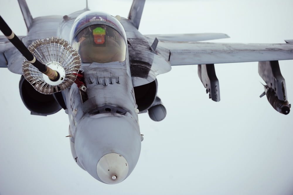 An FA-18 Super Hornet receives fuel over Afghanistan Canvas Art - Stocktrek Images (35 x 23)