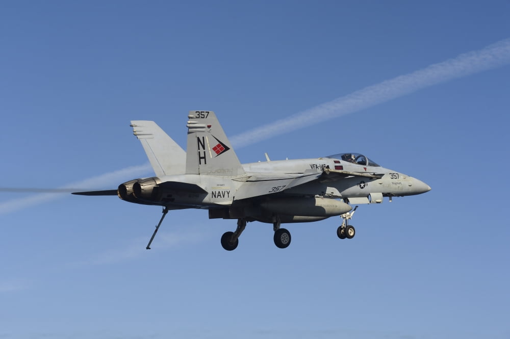 An FA-18C Hornet in flight Canvas Art - Stocktrek Images (34 x 23)