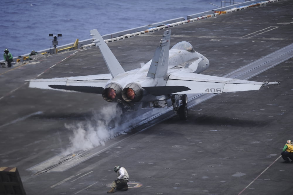 An FA-18C Hornet launches from the aircraft carrier USS Nimitz Canvas Art - Stocktrek Images (35 x 23)