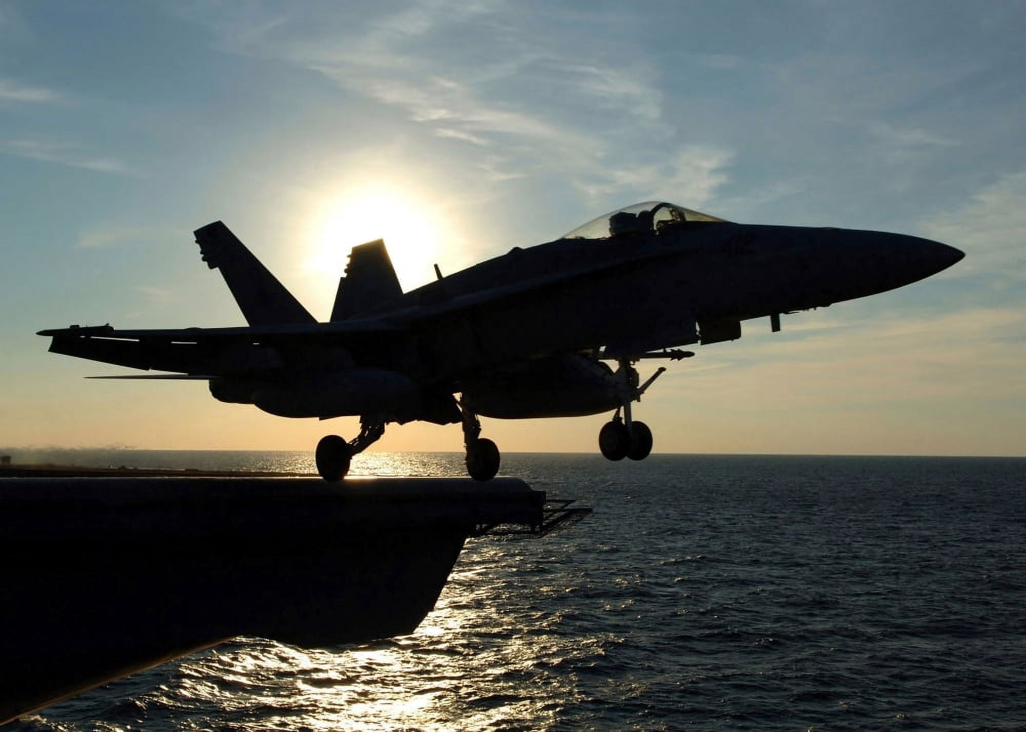 An FA-18C Hornet launches from the flight deck of USS Enterprise Canvas Art - Stocktrek Images (33 x 24)
