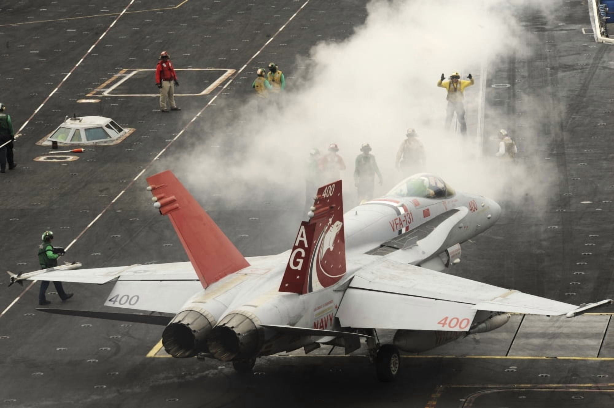 An FA-18C Hornet prepares to launch from the flight deck of USS Dwight D Eisenhower Canvas Art - Stocktrek Images (35 x 23)