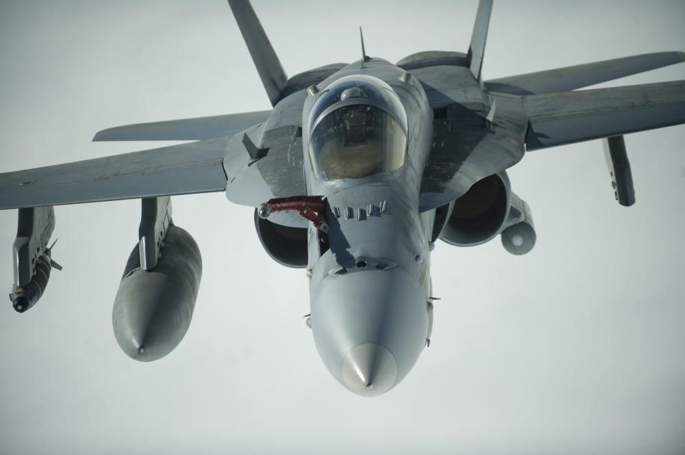 An FA-18C Hornet receives fuel over Afghanistan Canvas Art - Stocktrek Images (35 x 23)